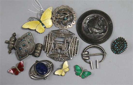 Four Norwegian silver and enamel butterfly brooches, and other items including brooches and a ring.